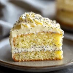 Lemon poppy seed sheet cake recipe slice with lemon curd swirl and cream cheese frosting