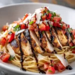 Chicken bruschetta pasta with tomato basil topping