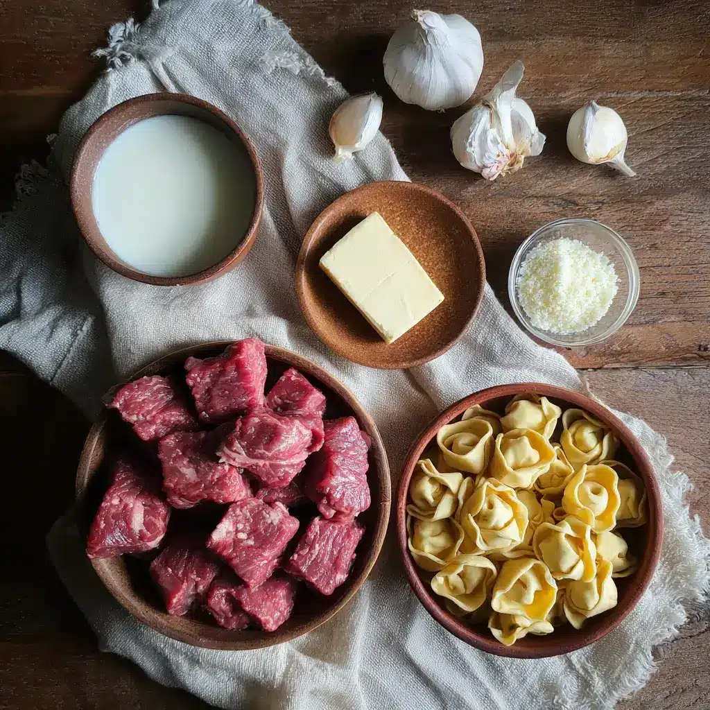 Ingredients for garlic butter steak bites and creamy Alfredo tortellini