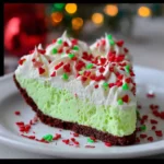 No Bake Grinch Pie with red heart sprinkles