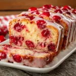 Cherry Garcia Loaf Cake with almond glaze and cherries