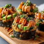 Spicy Salmon Rice Muffins with avocado and spicy mayo drizzle