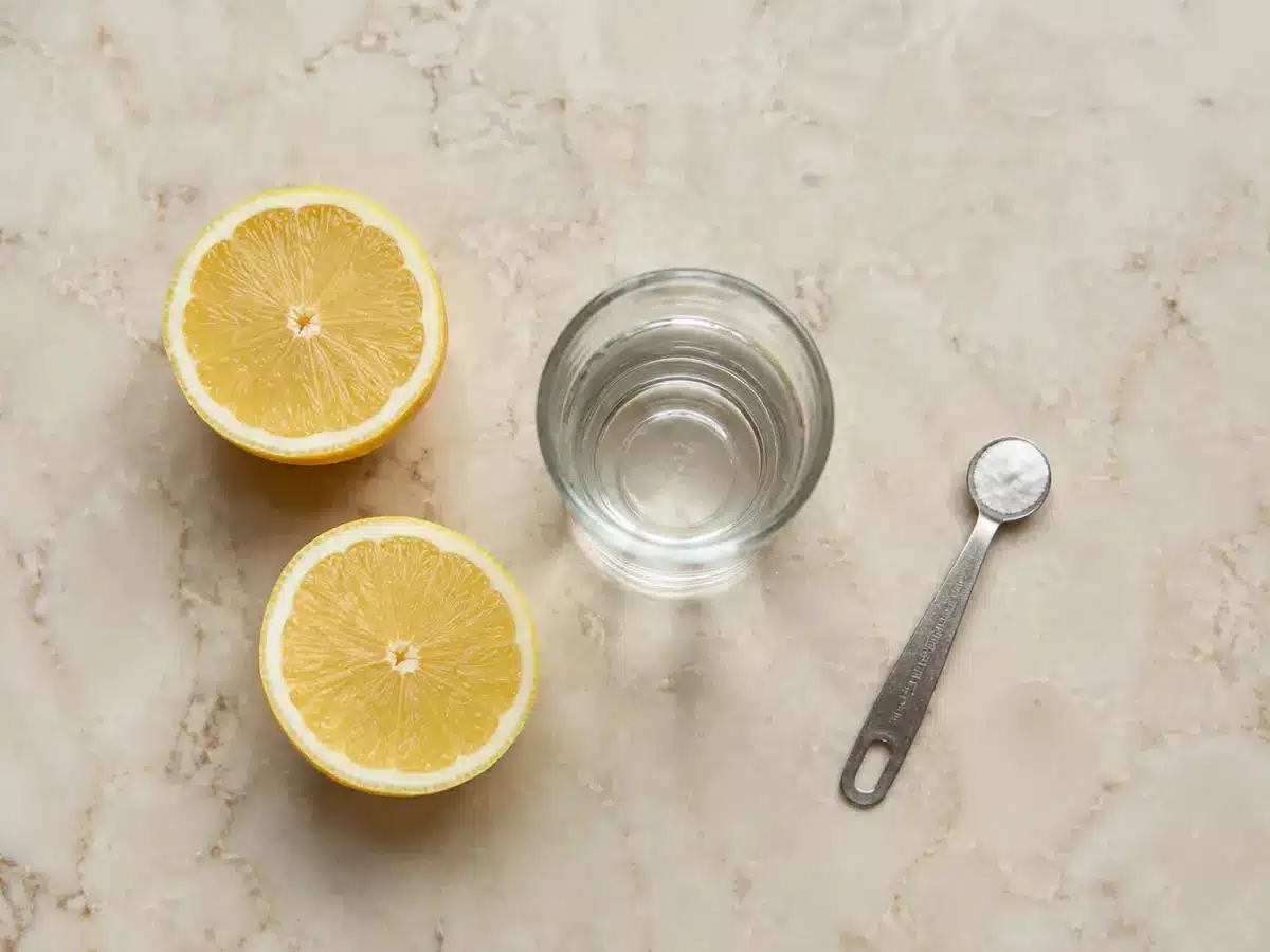 Water, fresh lemon, and a tiny measured amount of baking soda for a baking soda shot